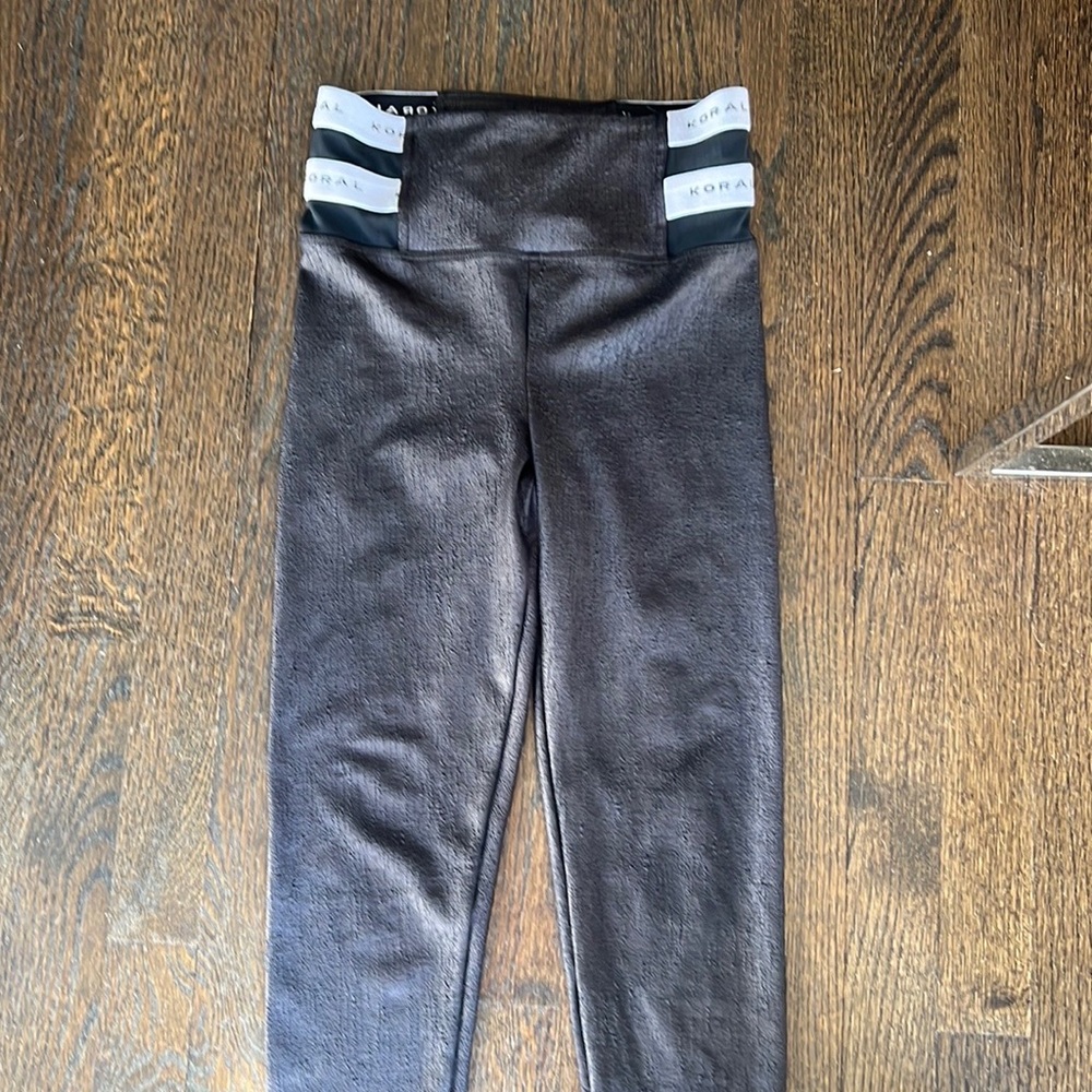 Koral leggings with white band at waist. Size small